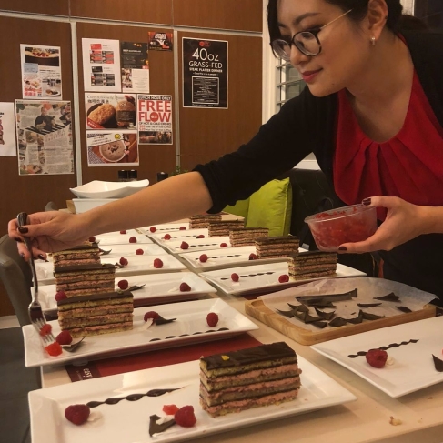 Plating the opera cake for a dinner party
